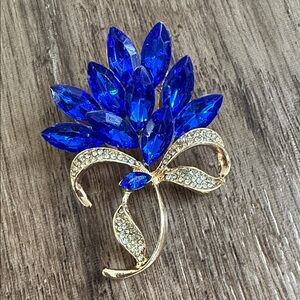 Elegant Blue Crystal Bow Brooch - Gold Tone